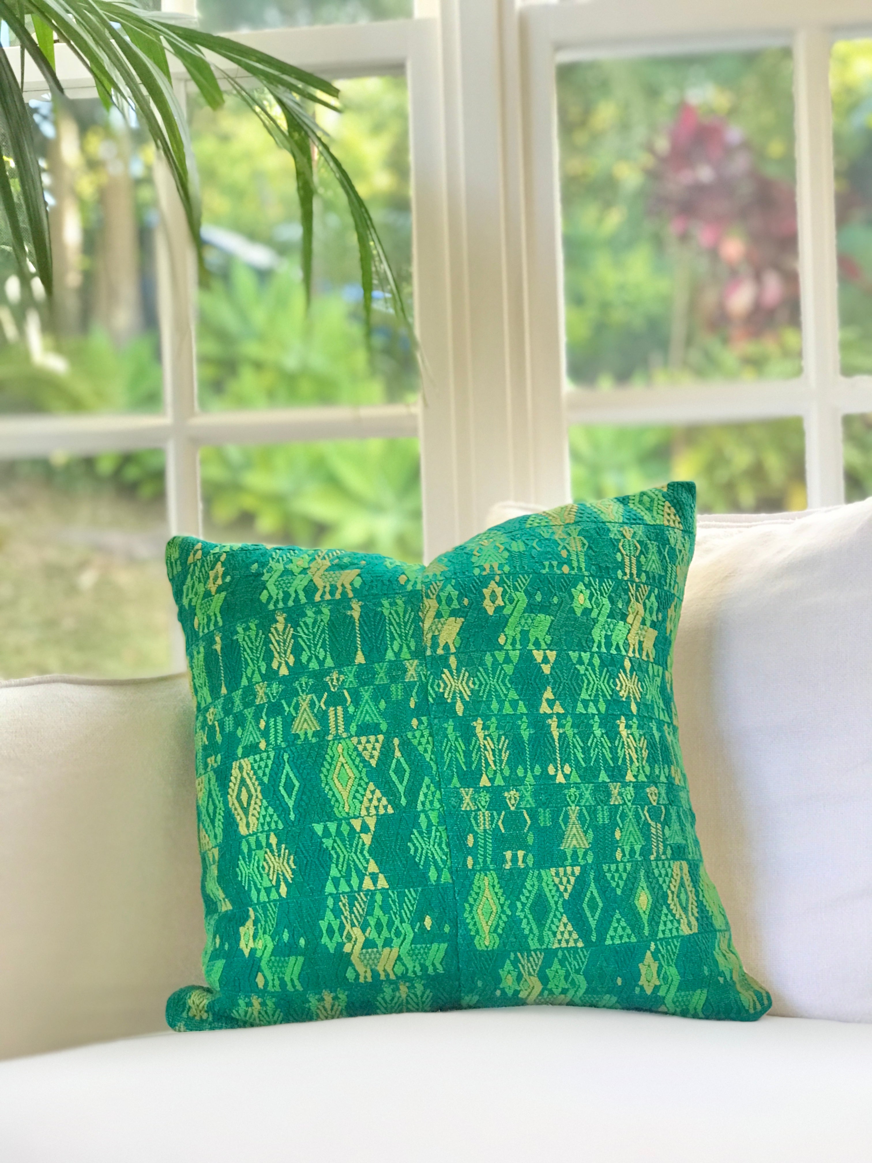 Vintage textile cushions made from a Guatemalan huipil and corte.