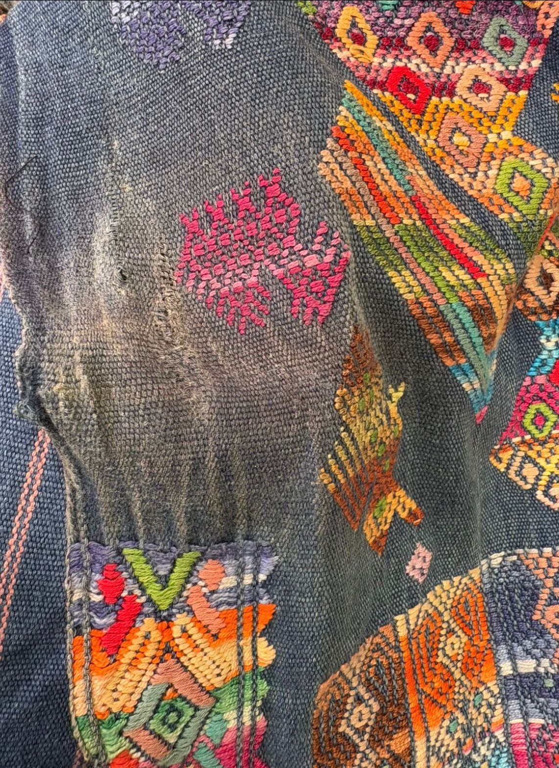 Indigo Nahuala huipil with colorful peacocks