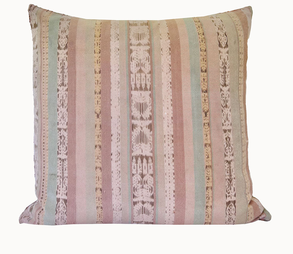 Embroidered Guatemalan huipil textile repurposed into a pillow