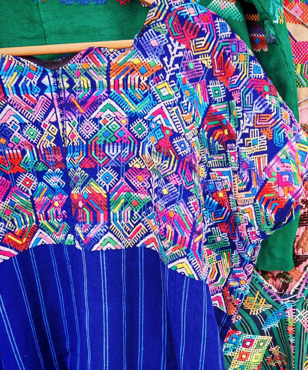 Bright blue Nahuala huipil