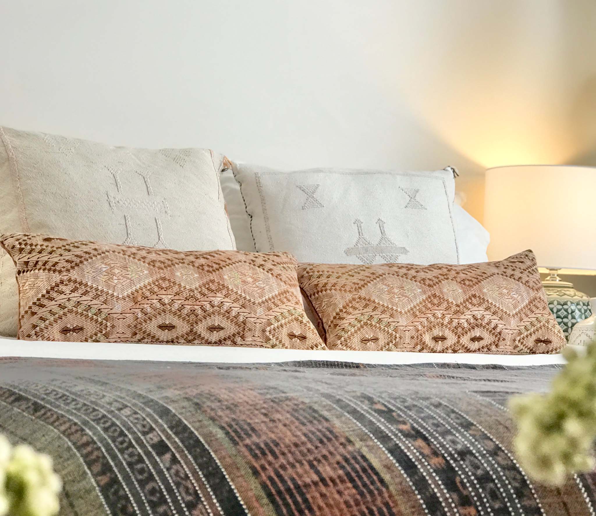 Guatemalan embroidered huipil pillow. Geometric chevron design in bold fuchsia