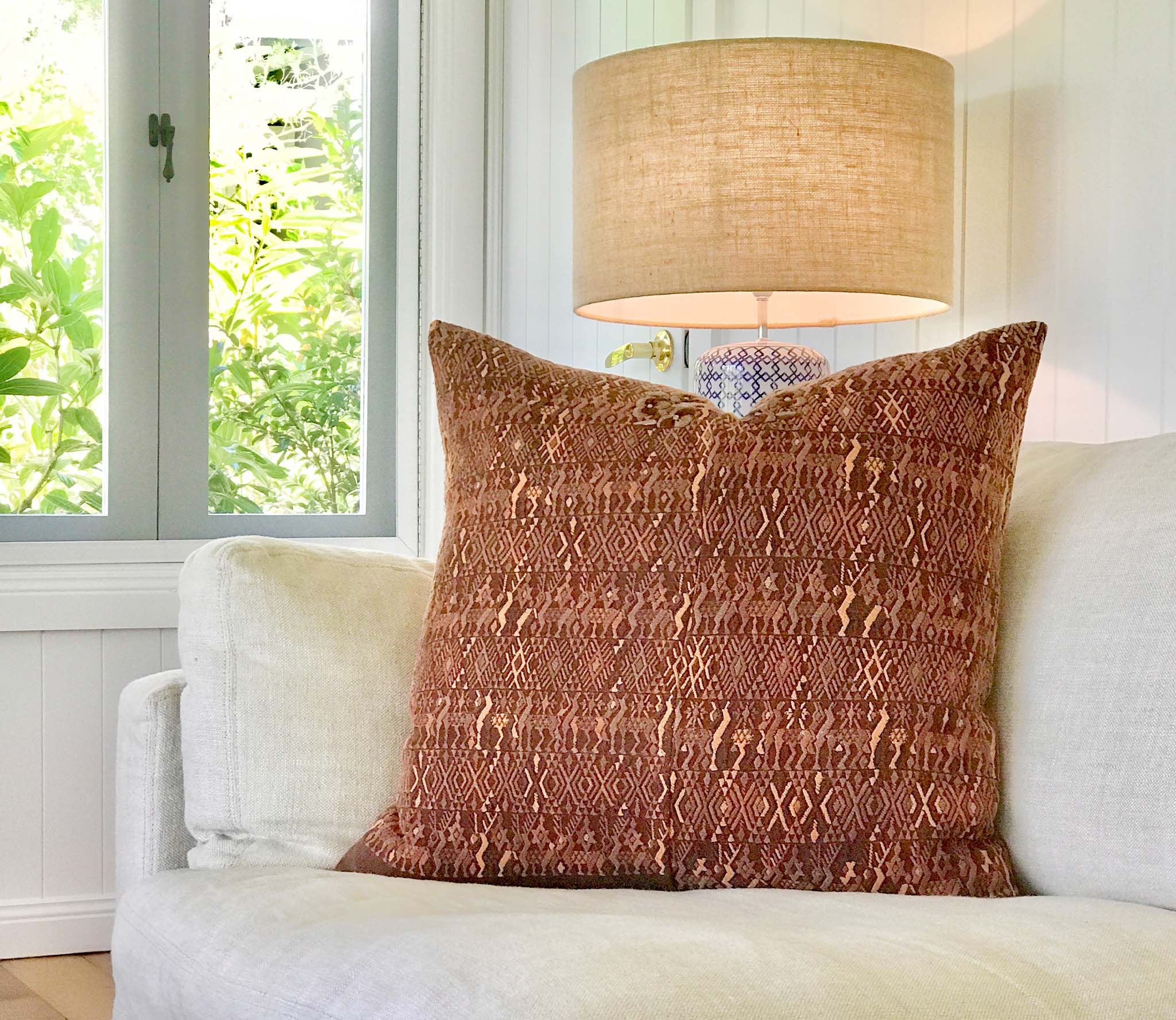 Vintage textile cushion made from a Guatemalan huipil and corte
