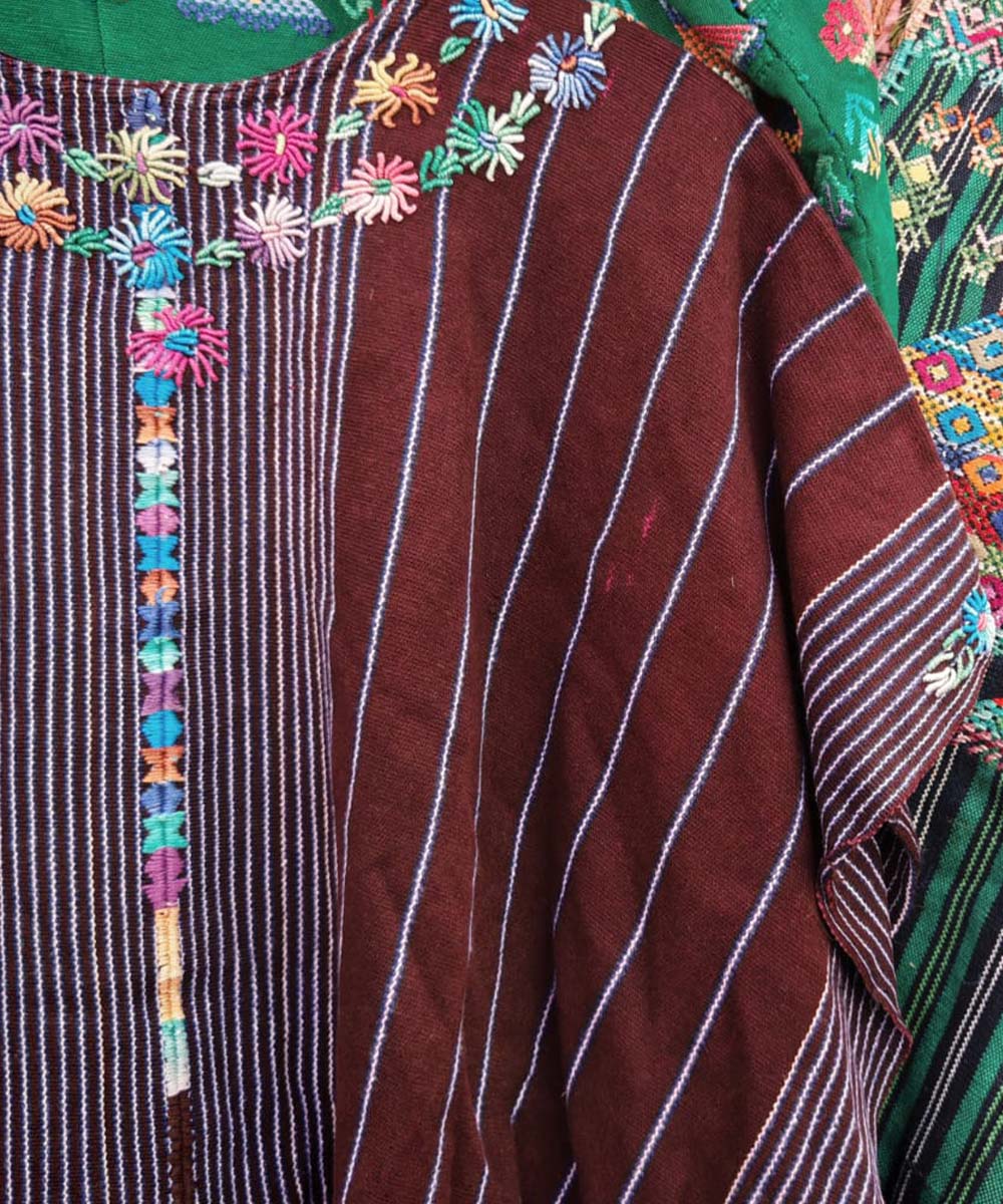 Burgundy huipil with floral neckline