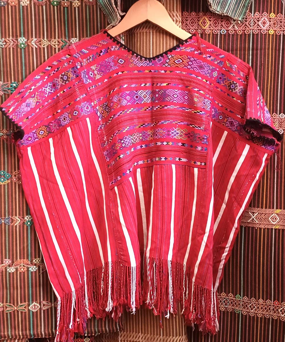 Red huipil with purple accents
