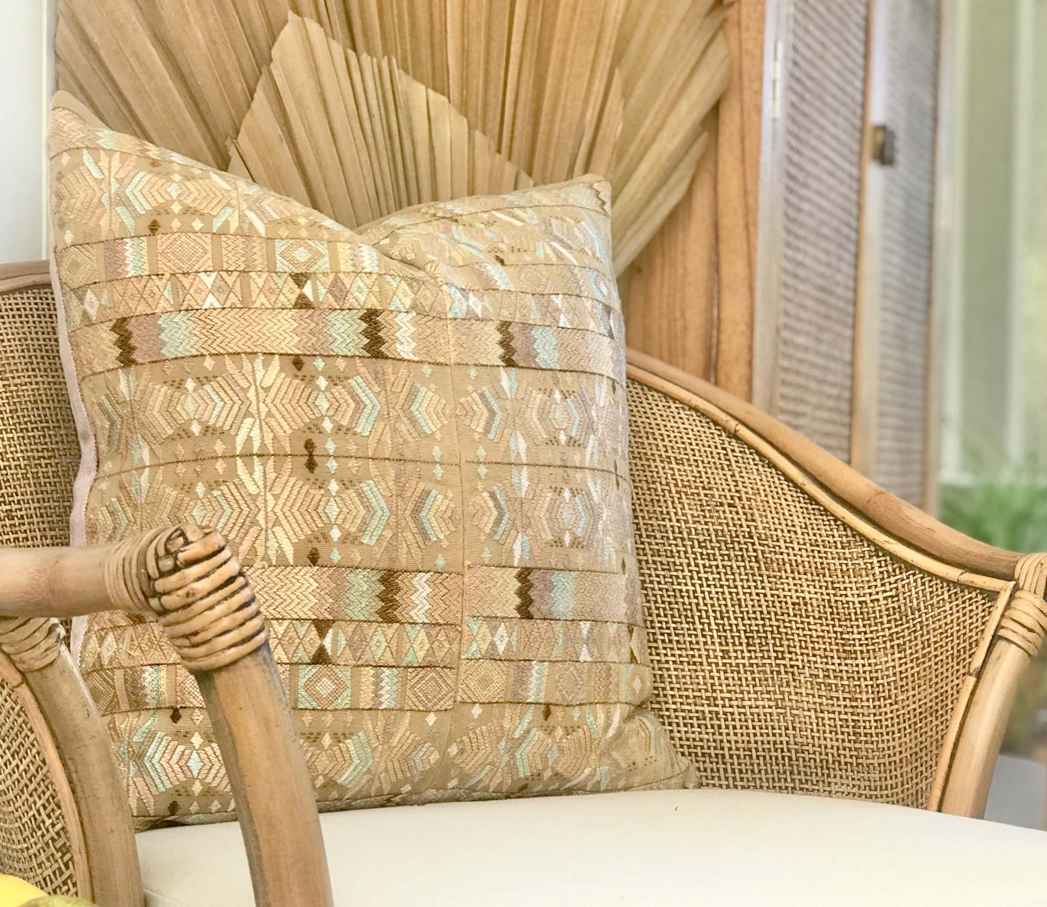 Vintage textile pillows made from a Guatemalan huipil and corte.