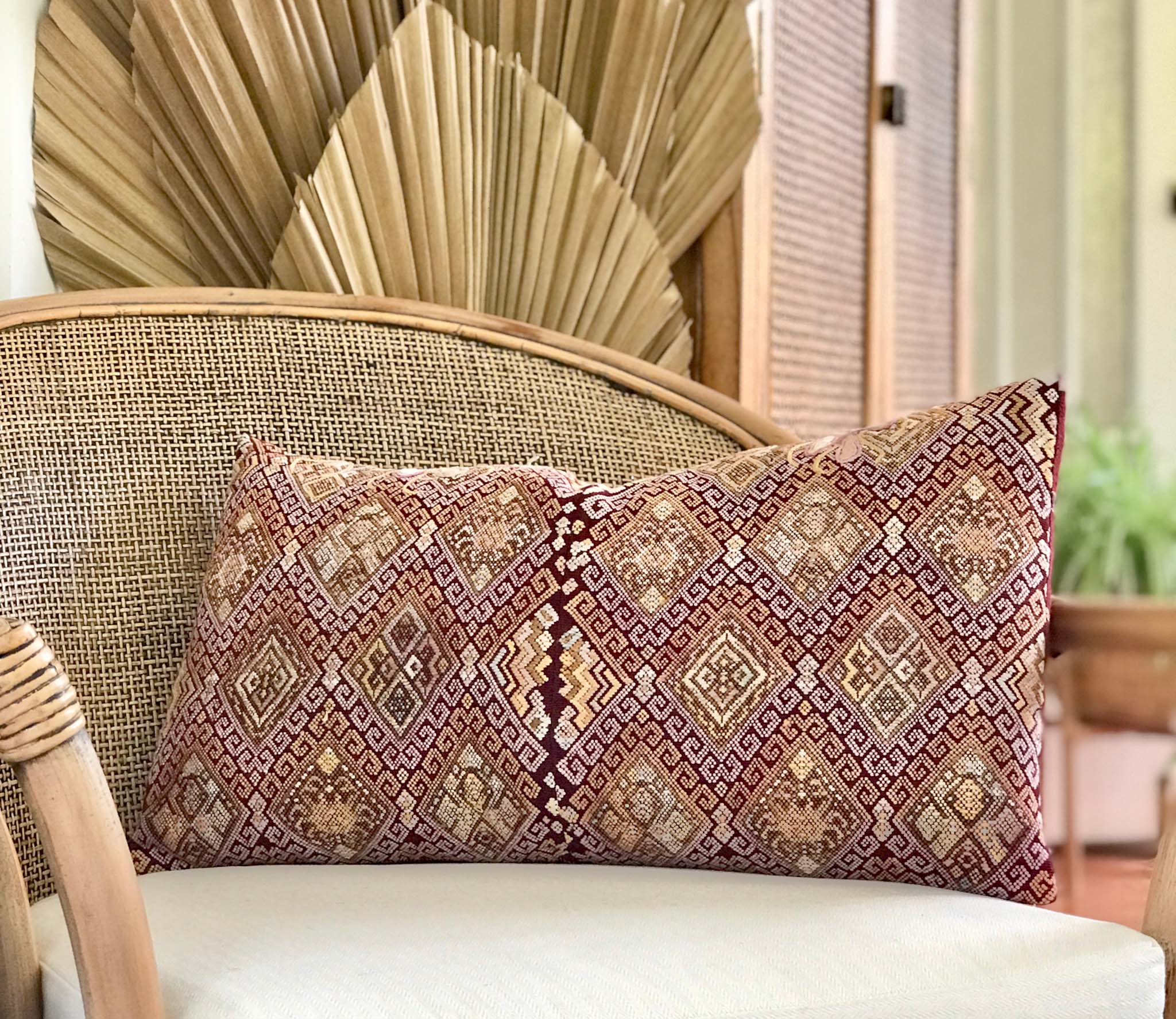 Vintage textile pillows made from a Guatemalan huipil and corte
