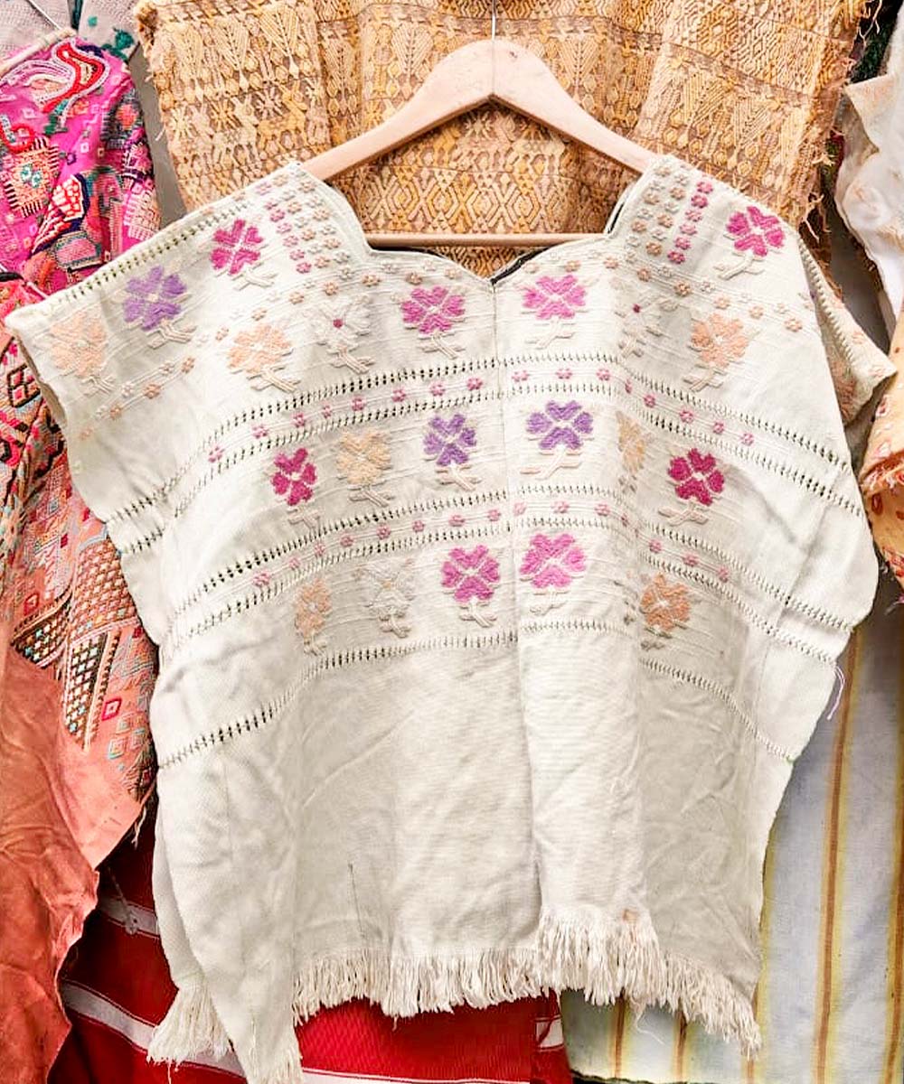 Pink and purple flowered huipil