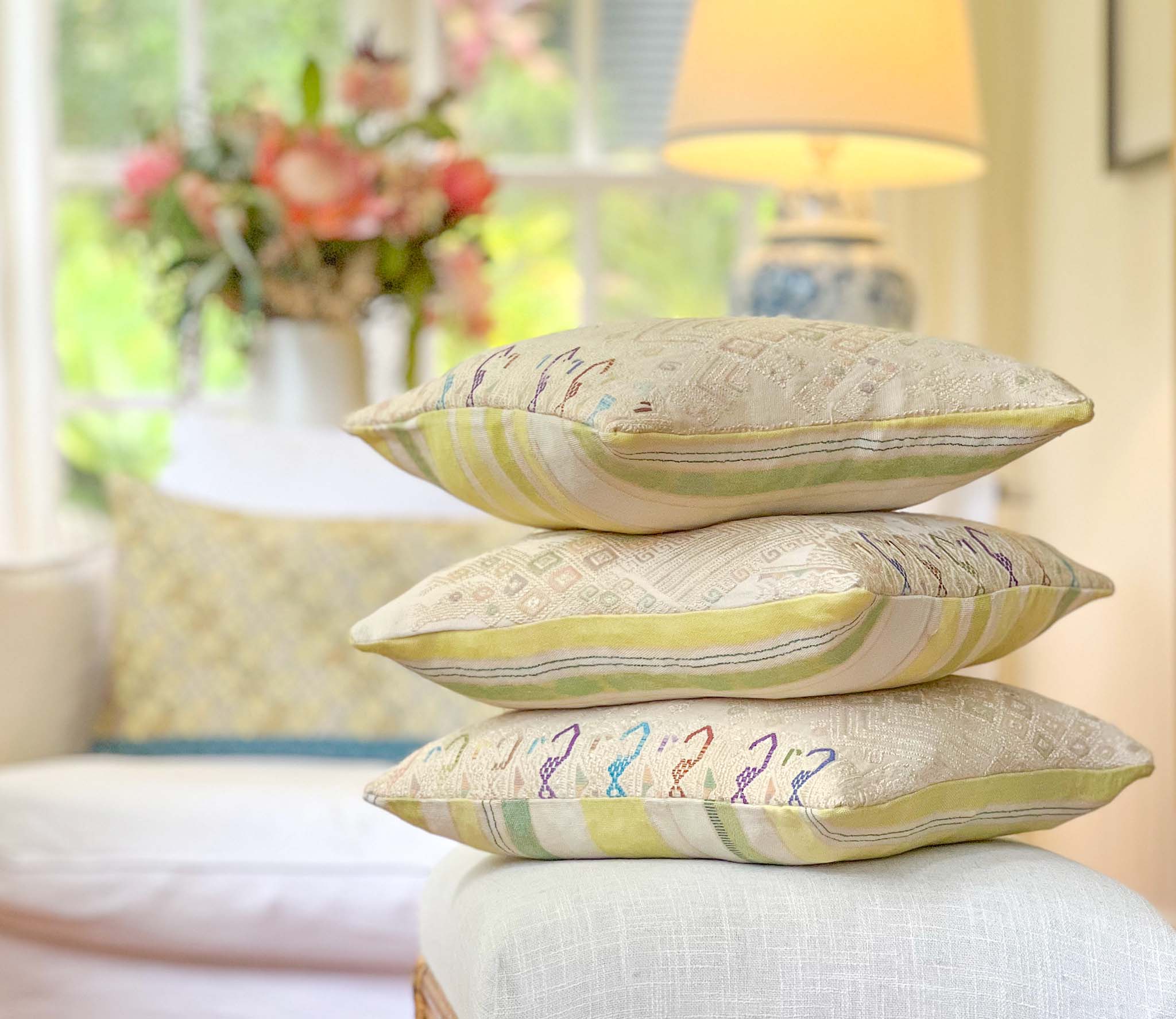 Embroidered Guatemalan huipil textile repurposed into a pillow