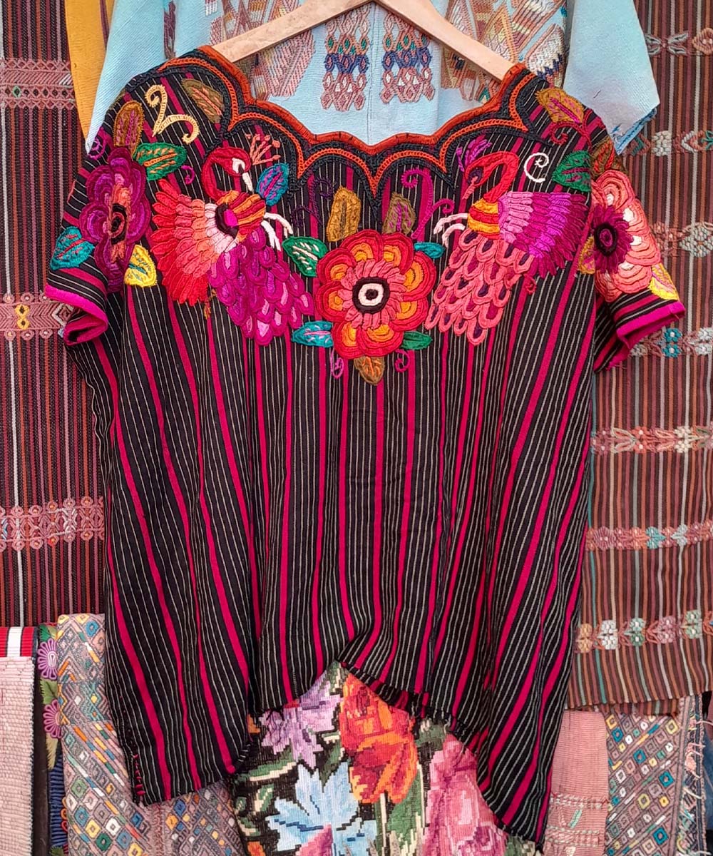 Dramatic striped Chichi huipil with peacocks