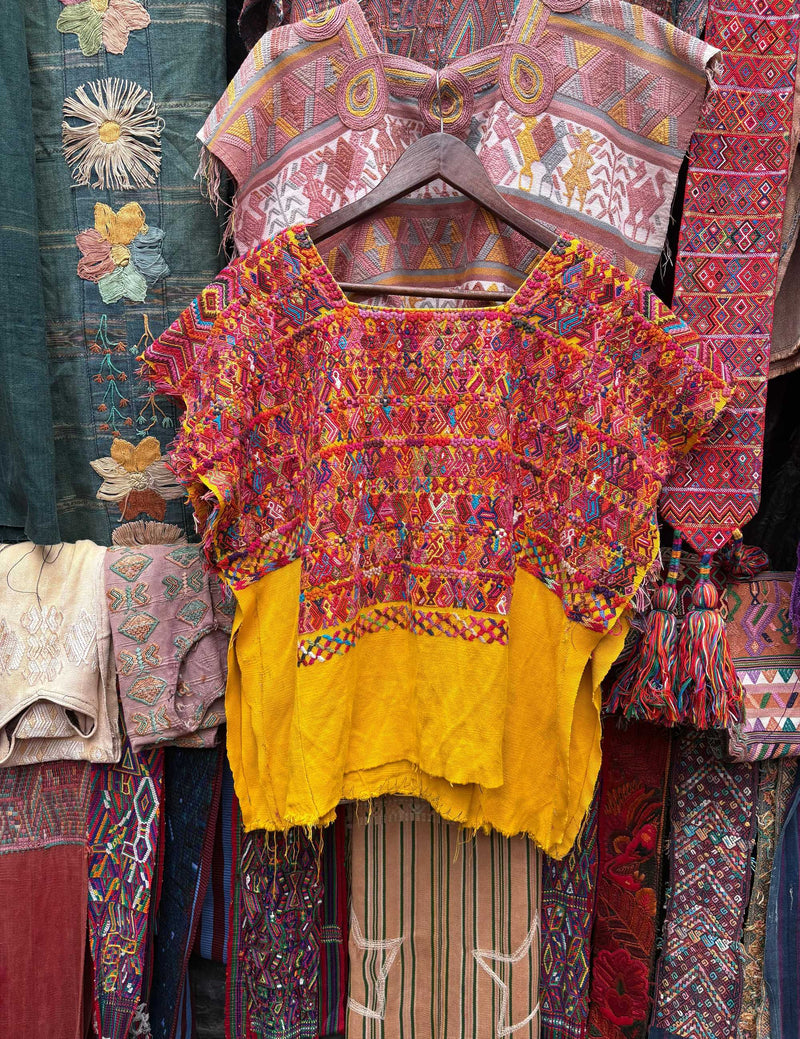 Pink and yellow San Juan Cotzal huipil #2-78