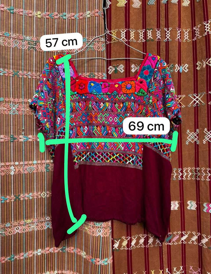 Colourful on burgundy San Juan Cotzal huipil #5-157