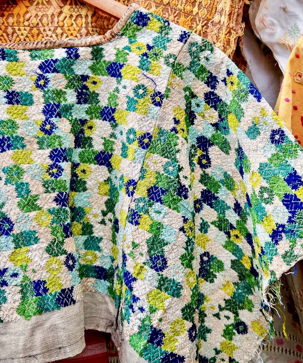 Green blue and white Coban huipil