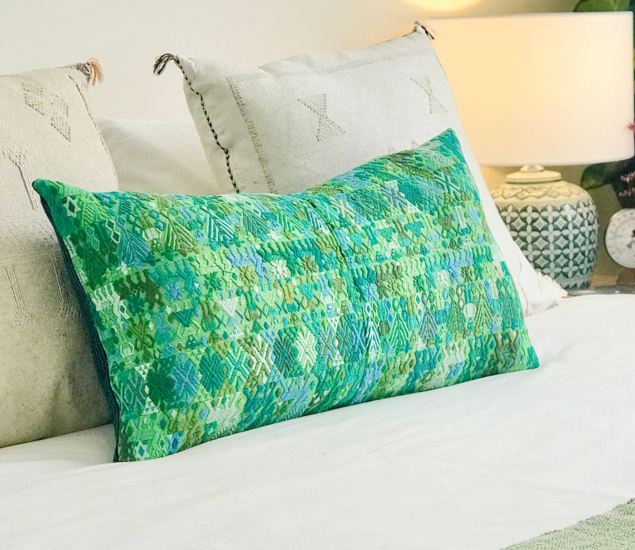 Vintage textile cushions made from a Guatemalan huipil and corte.