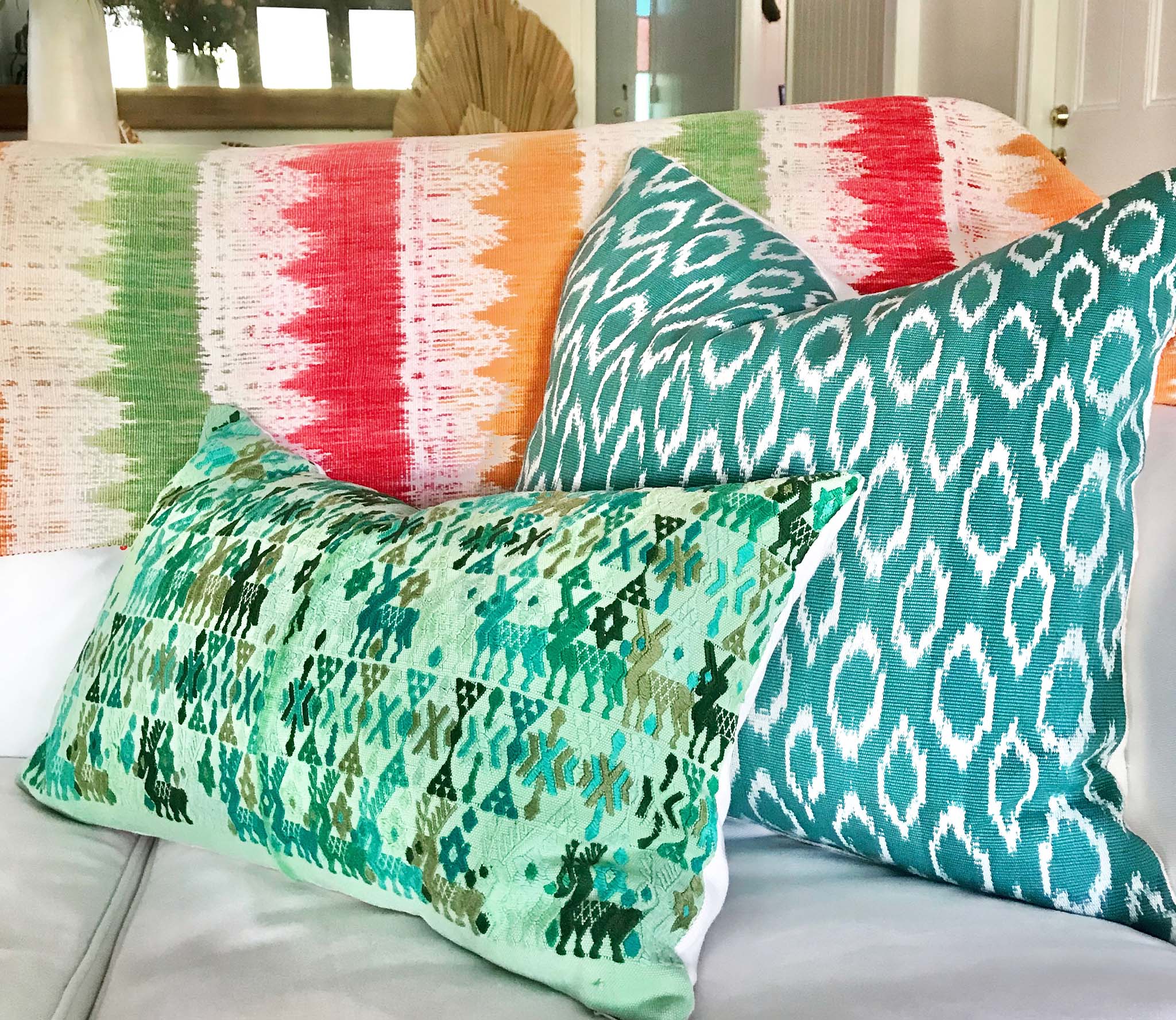 Guatemalan embroidered huipil pillow. Tribal symbols for bohemian decor.