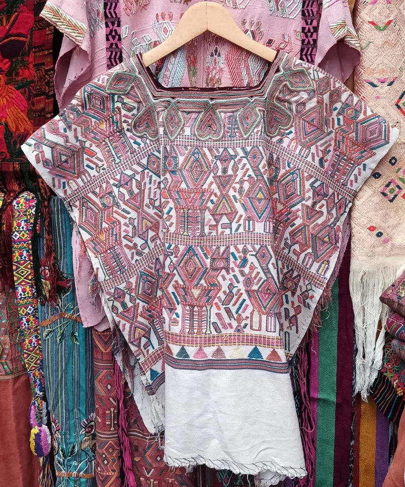 Embroidered Guatemalan huipil textile