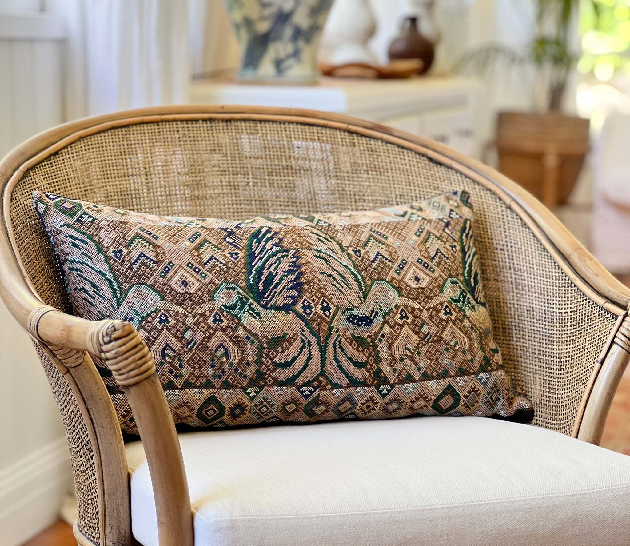 Embroidered Guatemalan huipil textile repurposed into a pillow