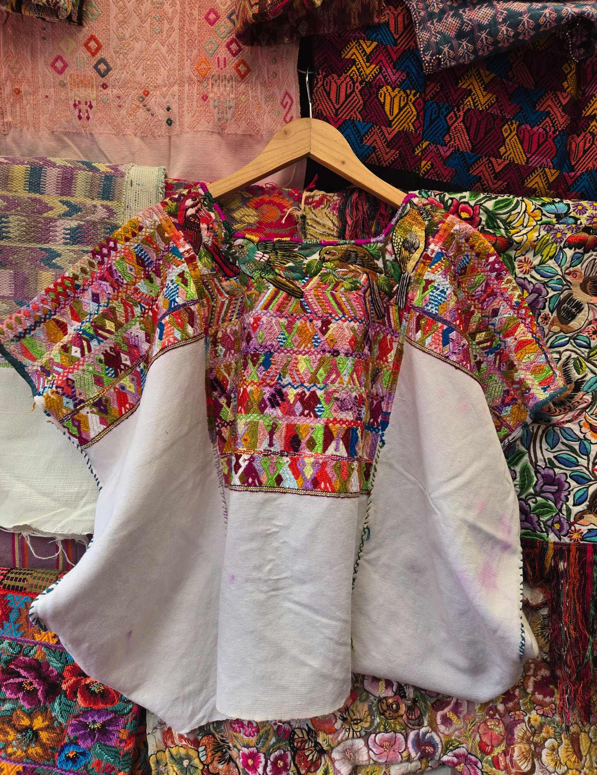 White color, made with pure silk thread with bird embroidery on the collar Chichicastenango Huipil #10-283