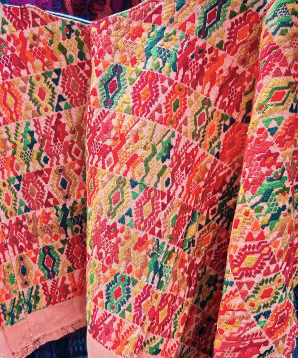 Colourful on peach Coban huipil