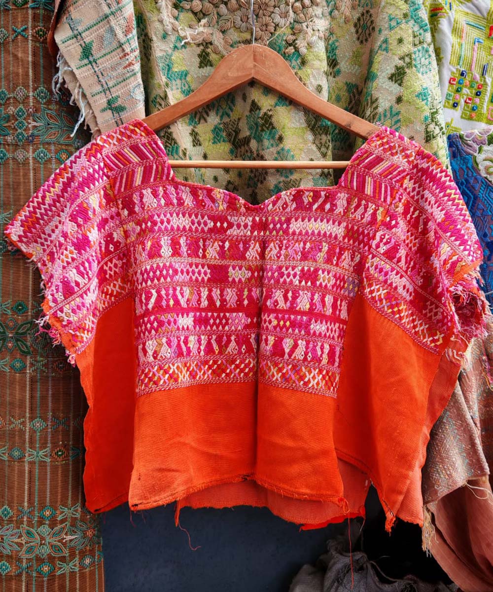 Bright red San Juan Cotzal huipil