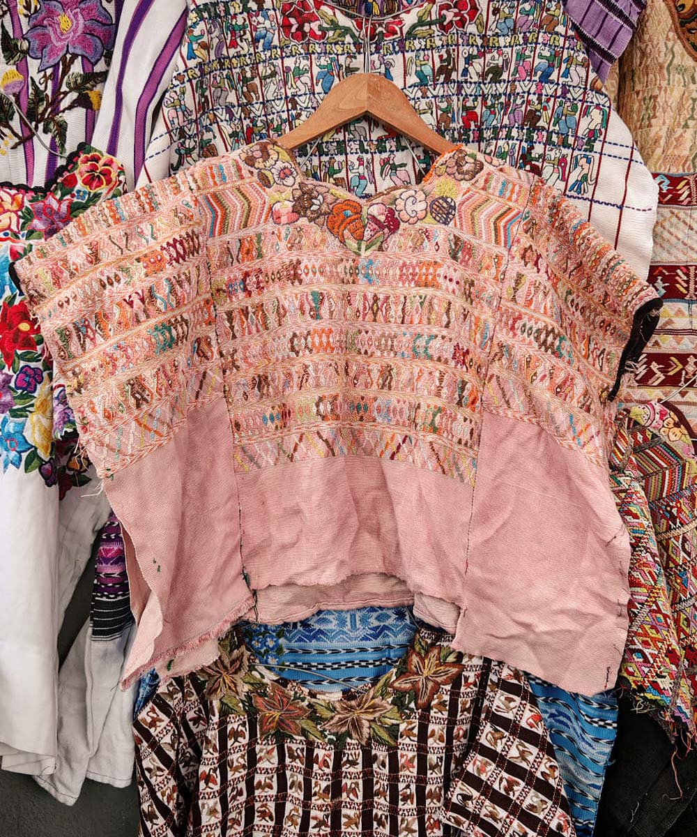 Pale pink San Juan Cotzal huipil