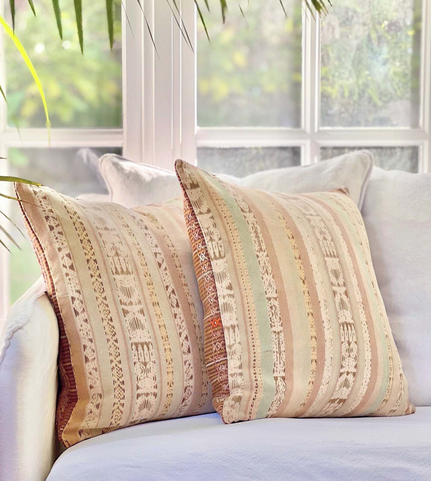 Embroidered Guatemalan huipil textile repurposed into a pillow