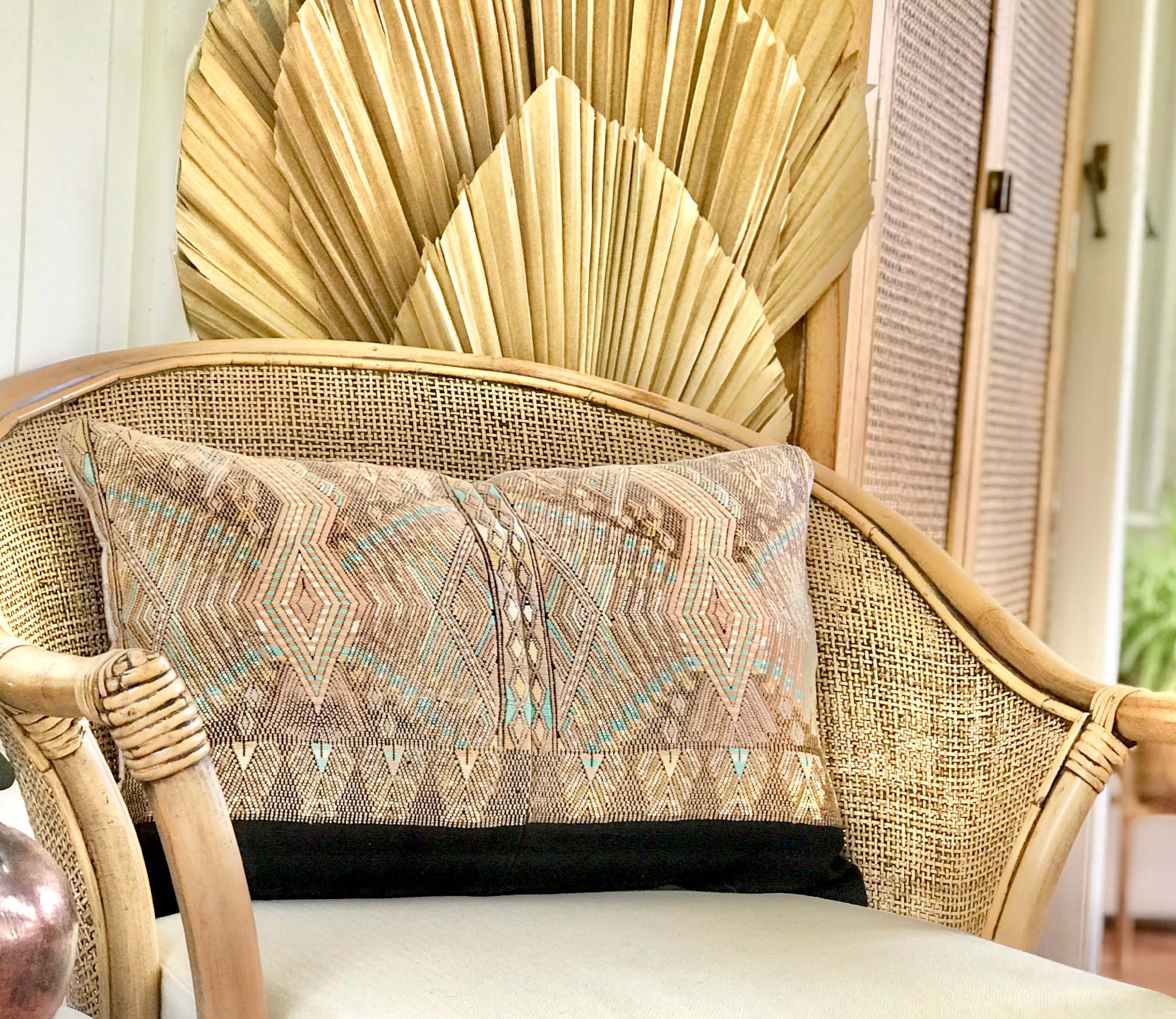 Embroidered Guatemalan huipil textile repurposed into a pillow