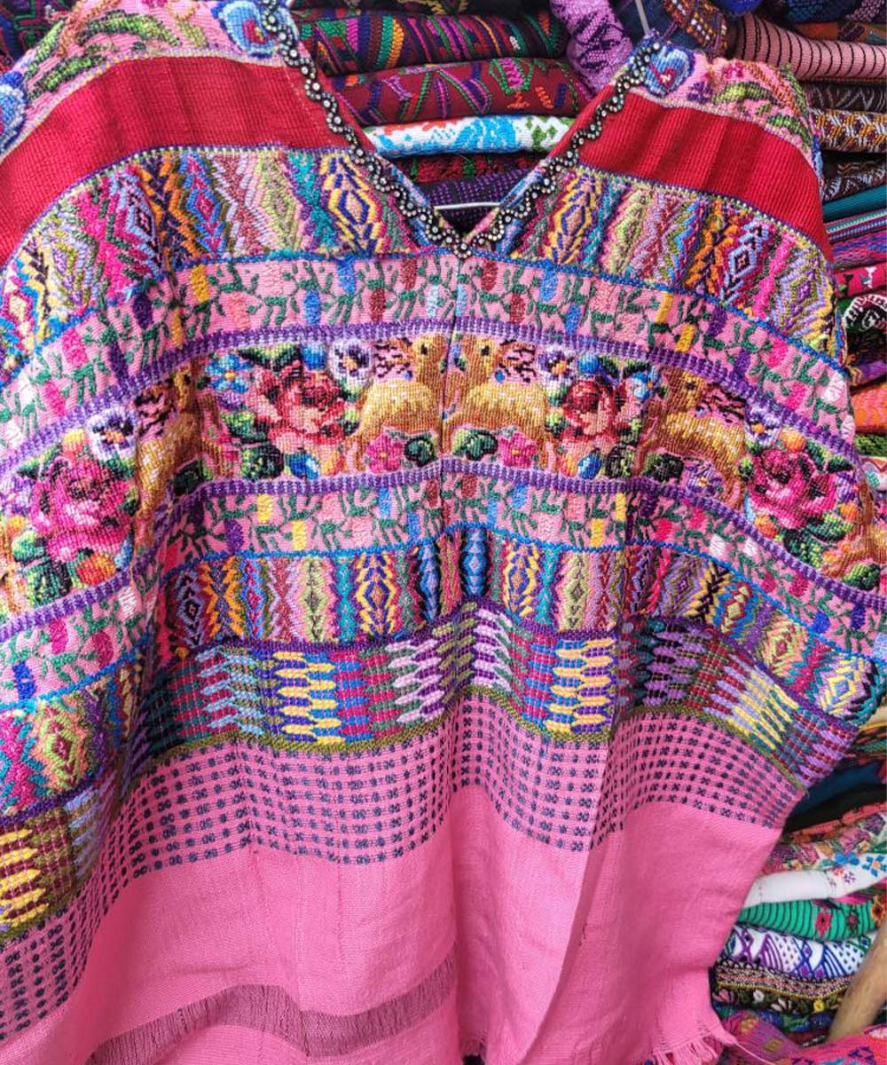 Colorful pink Aguas Calientas huipil