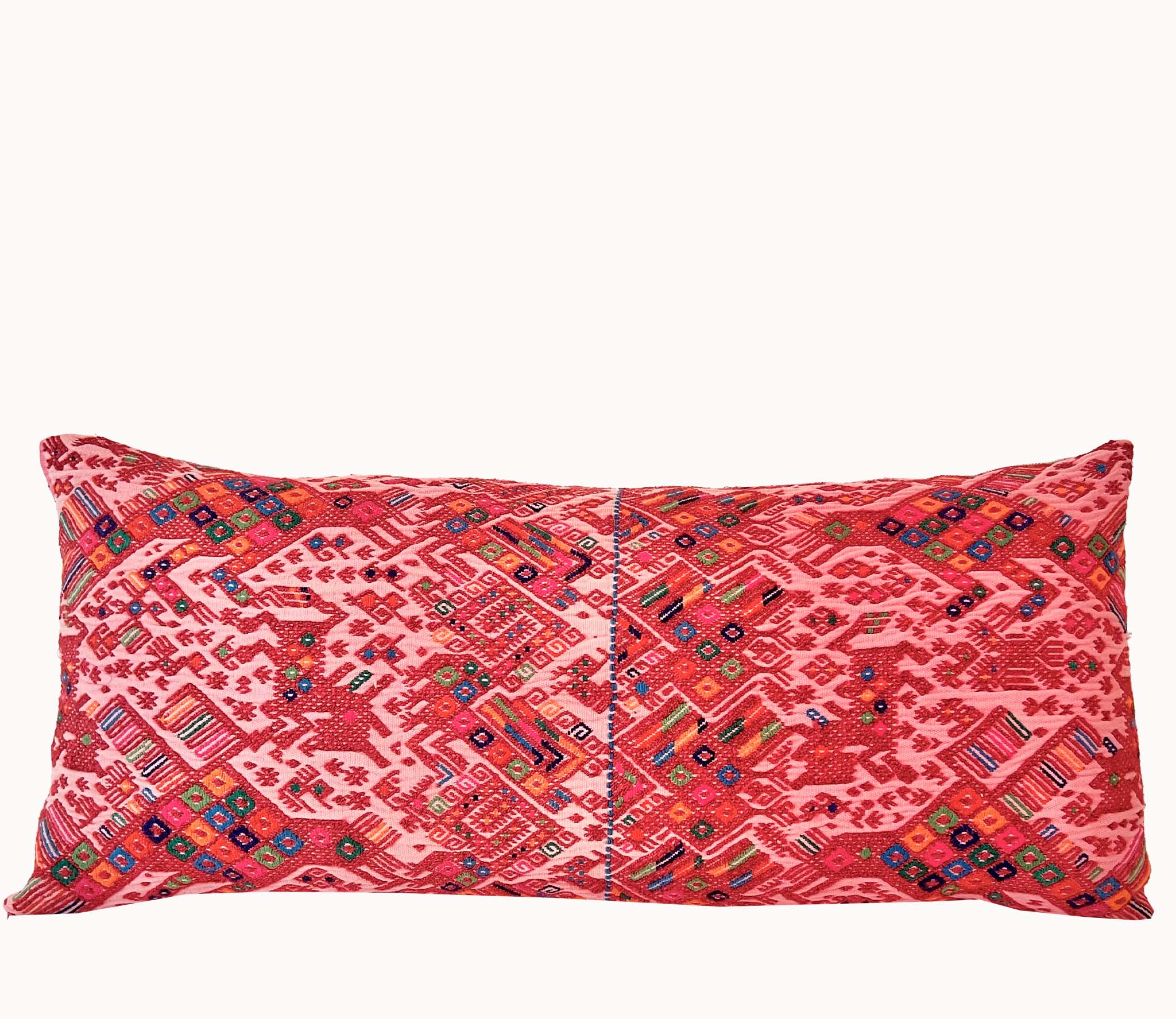 Embroidered Guatemalan huipil textile repurposed into a pillow