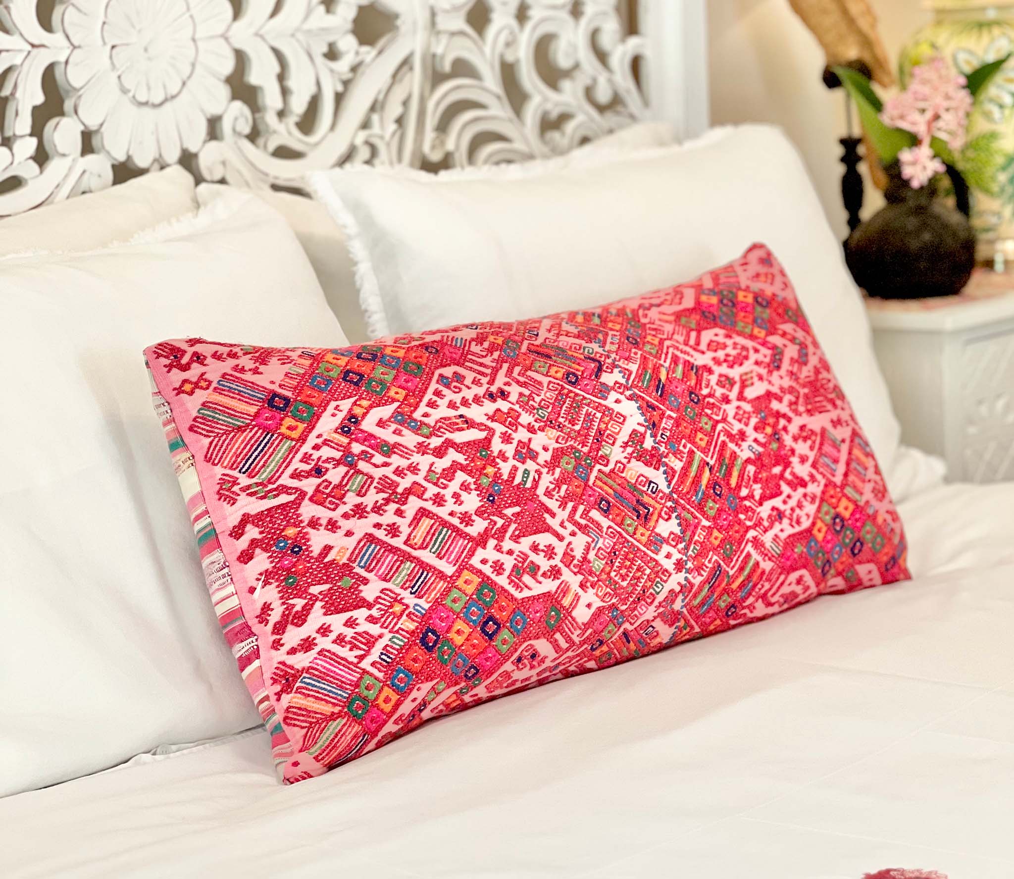Embroidered Guatemalan huipil textile repurposed into a pillow