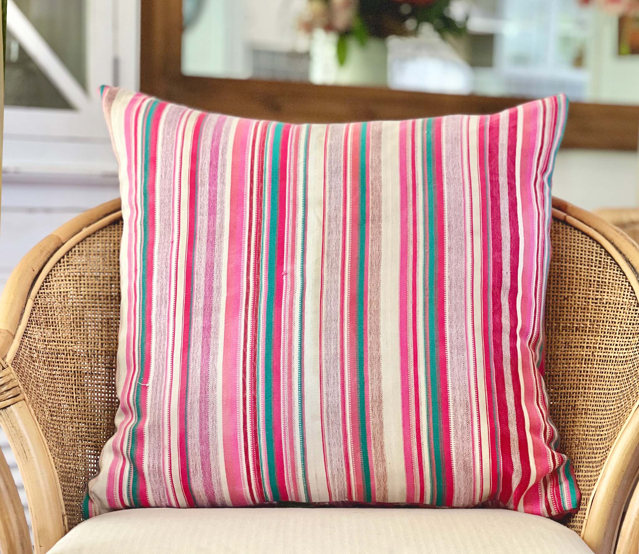 Embroidered Guatemalan huipil textile repurposed into a pillow