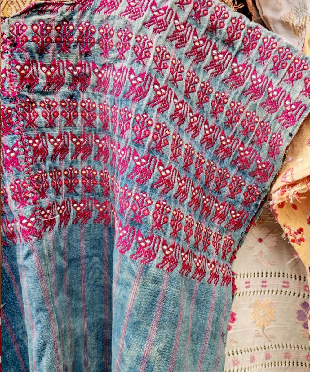 Faded indigo Nahuala huipil with pink cats