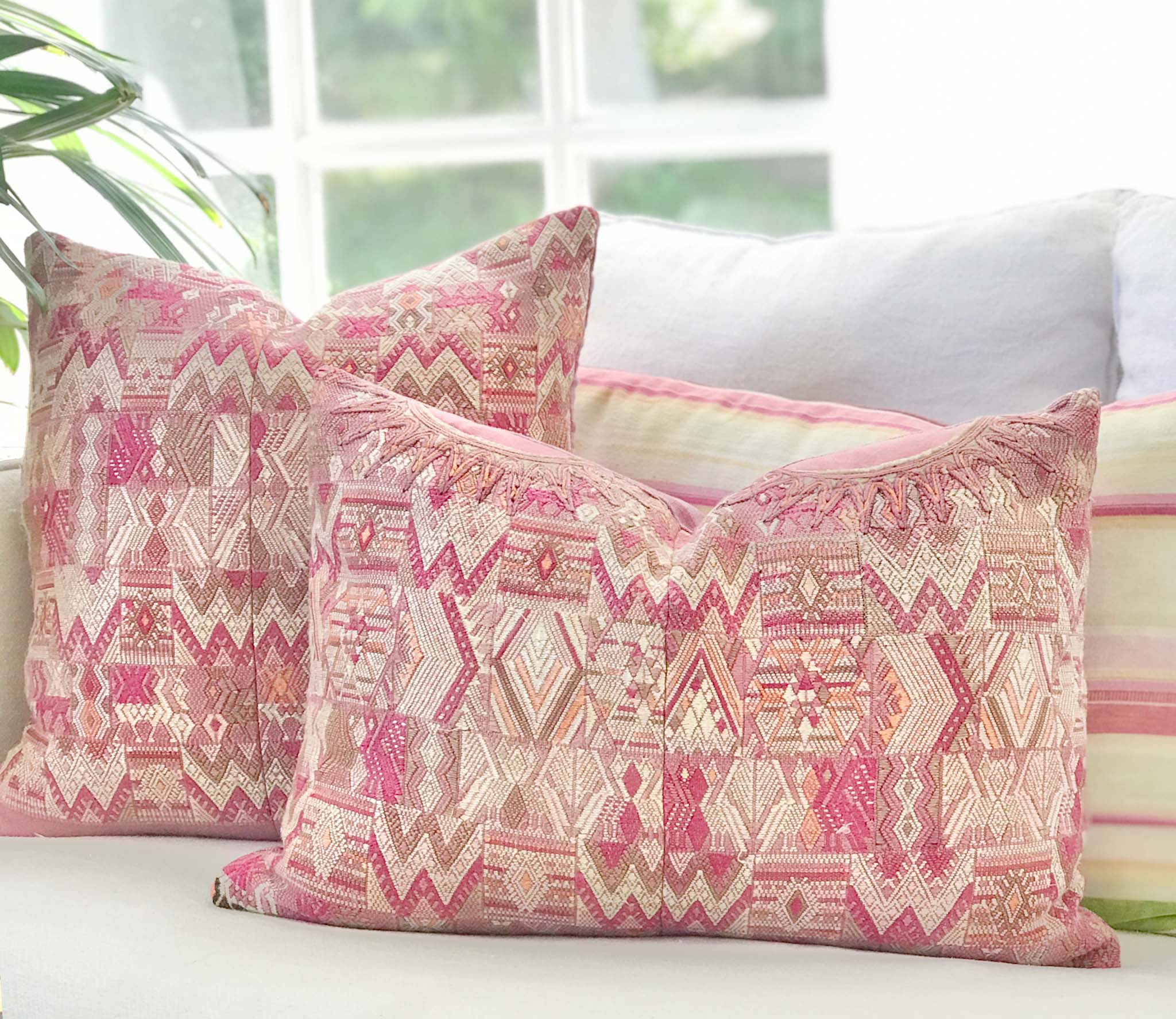 Vintage textile cushions made from a Guatemalan huipil and corte.