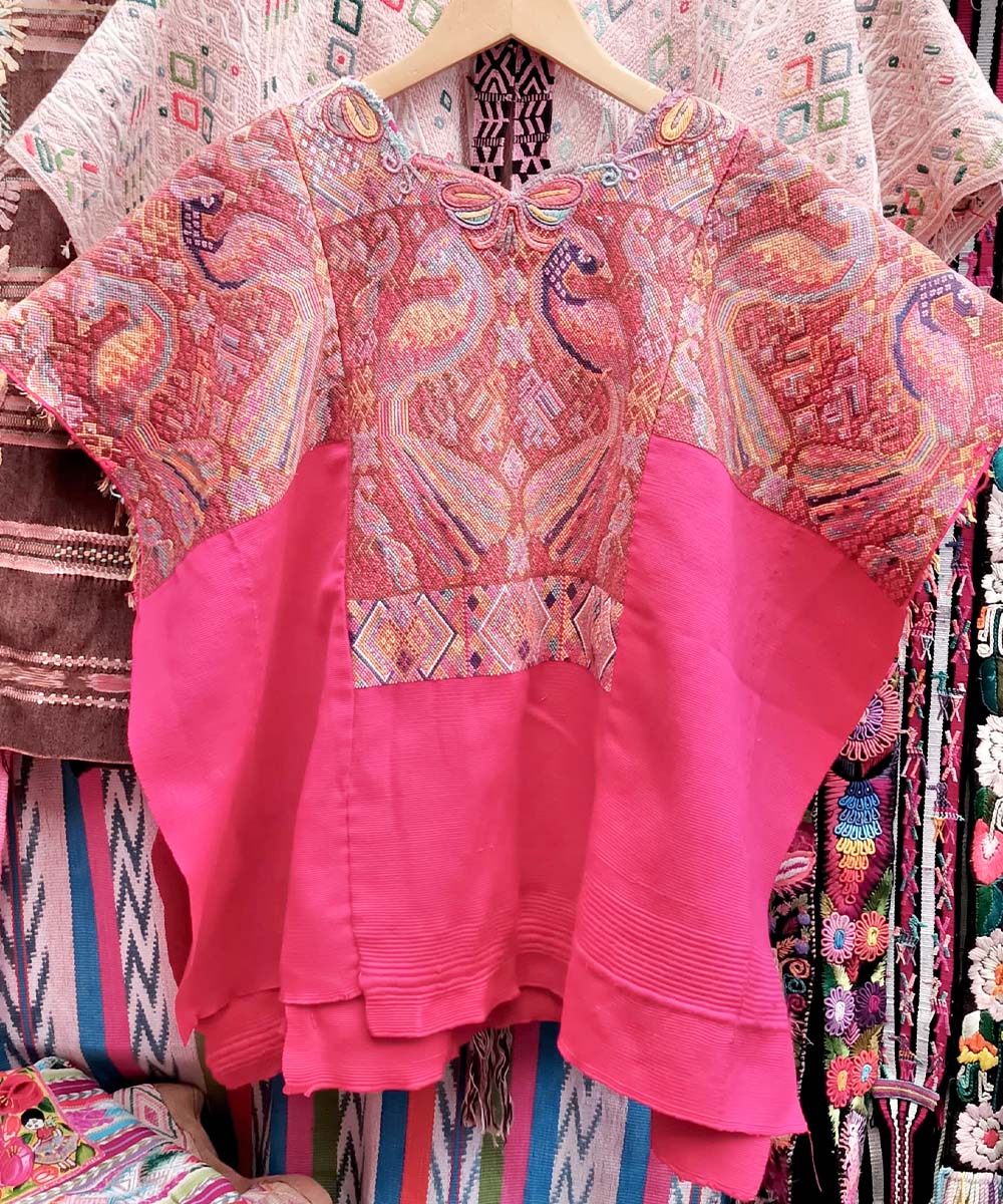 Hot pink Chichi huipil with peacocks