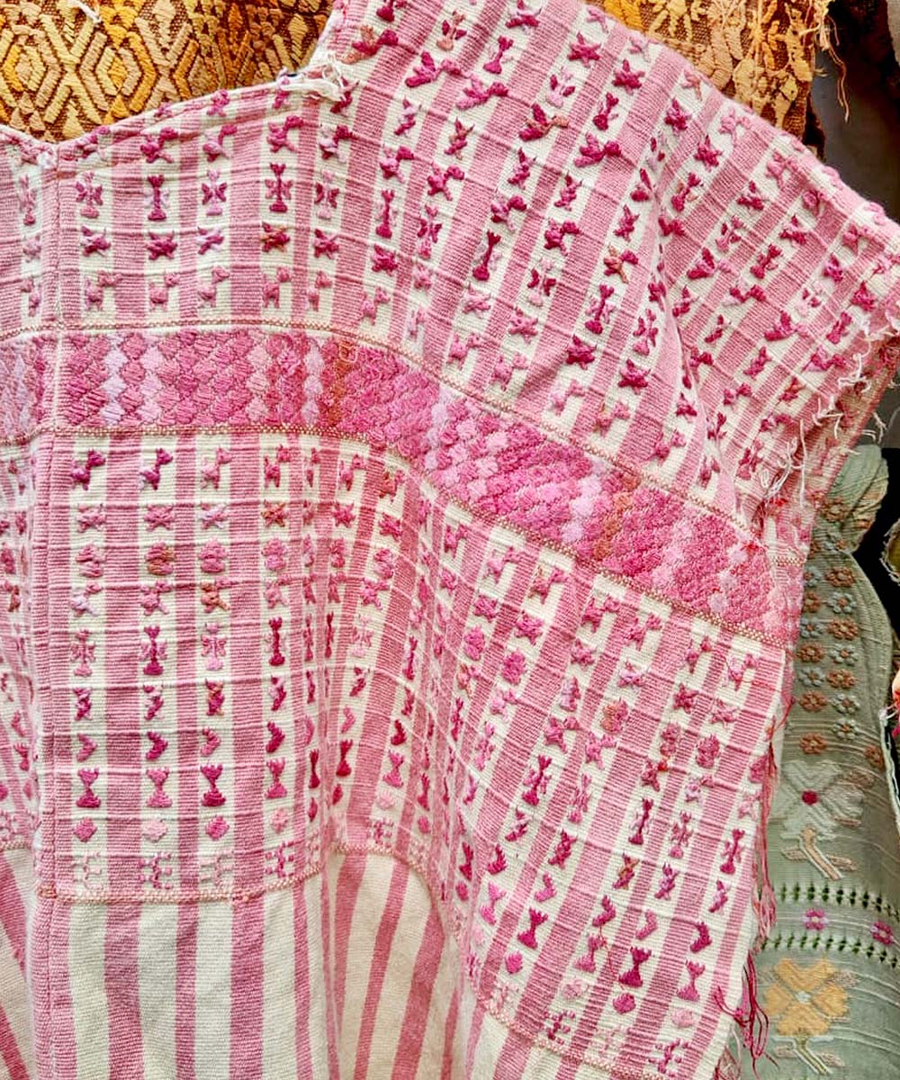 Pink and white San Lucas huipil