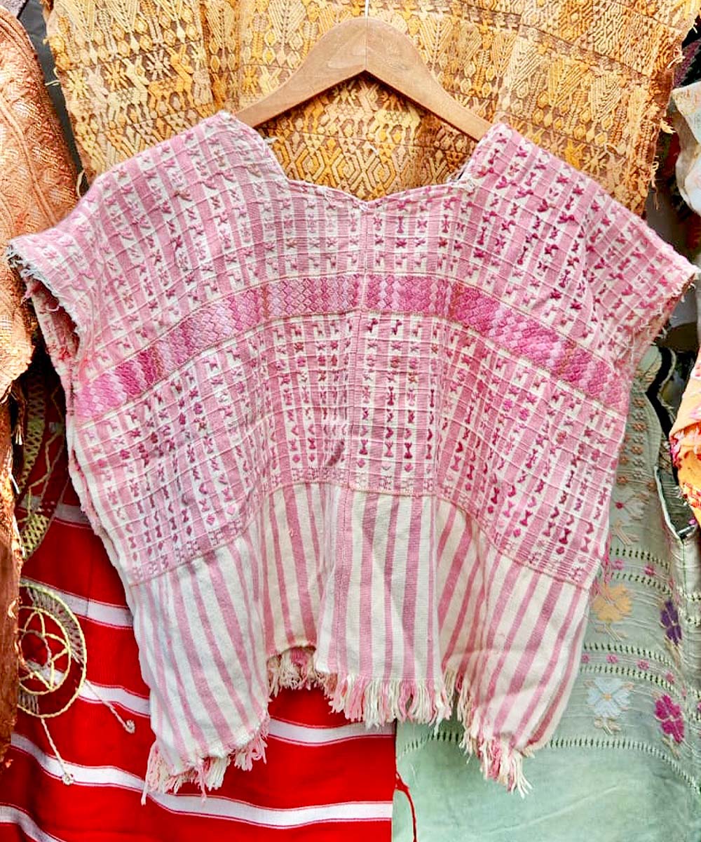 Pink and white San Lucas huipil