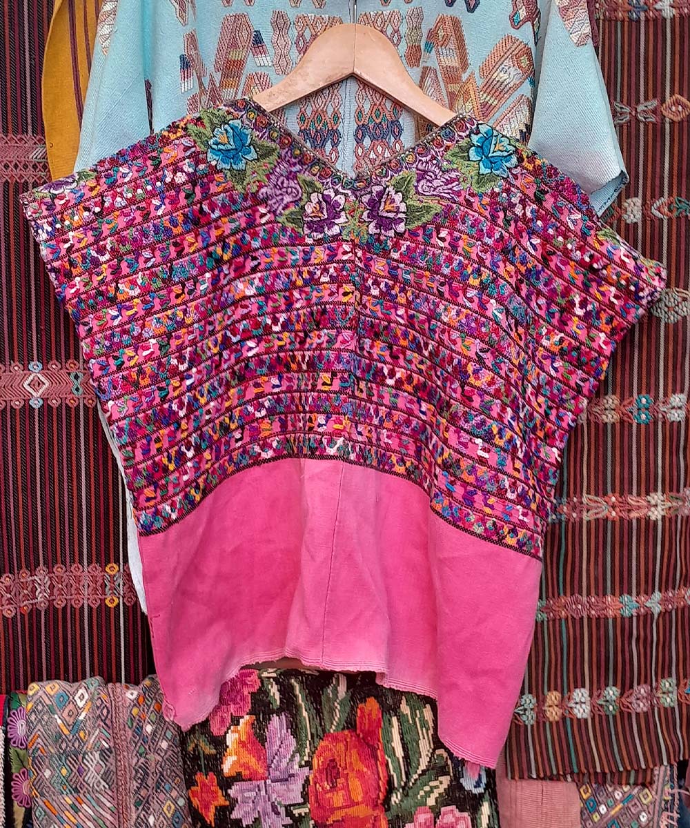 Hot pink San Lucas huipil with floral neckline