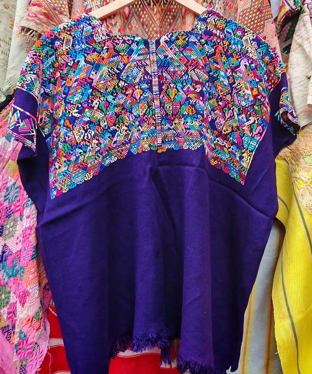 Colorful on purple Nahuala huipil