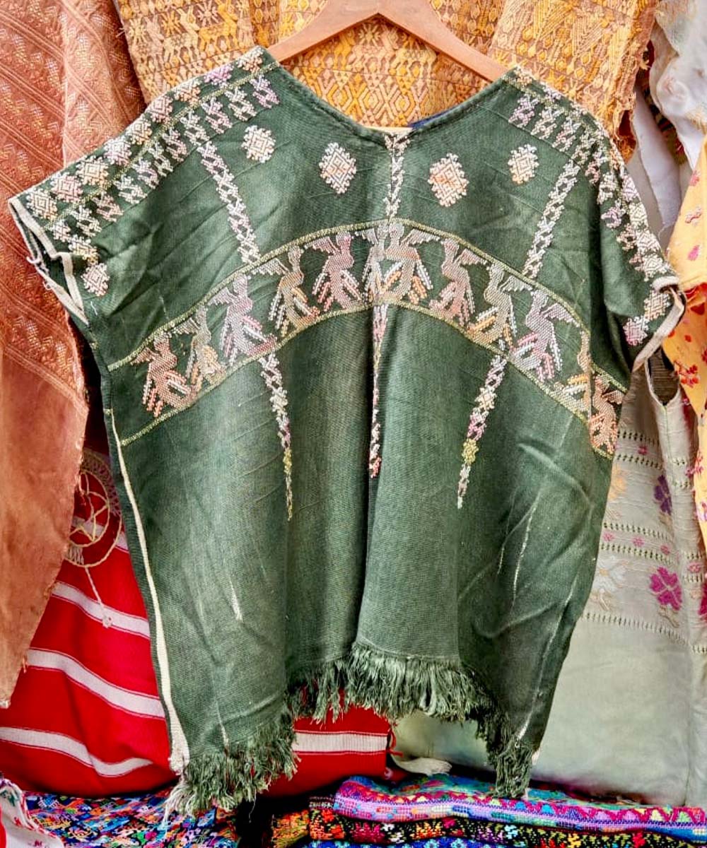 Green huipil with Quetzales