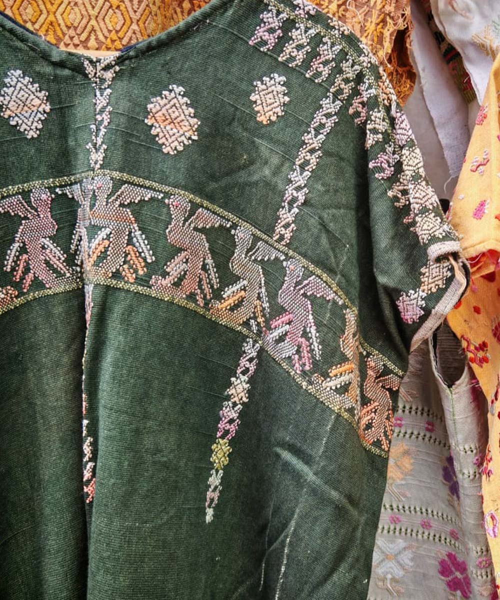 Green huipil with Quetzales