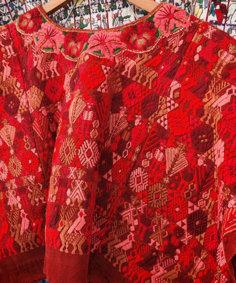 Vibrant red Coban huipil