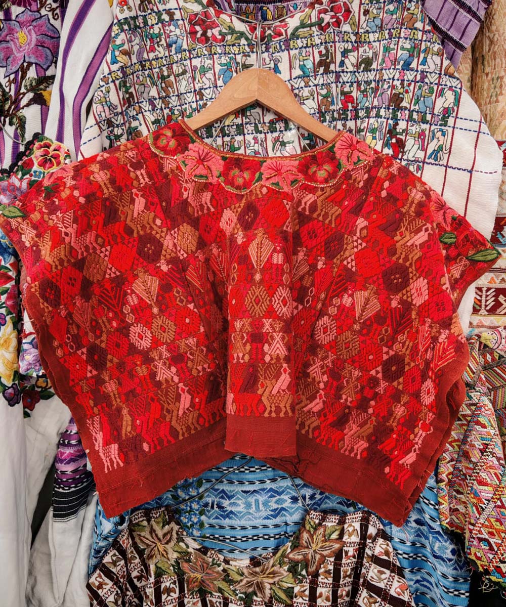 Vibrant red Coban huipil