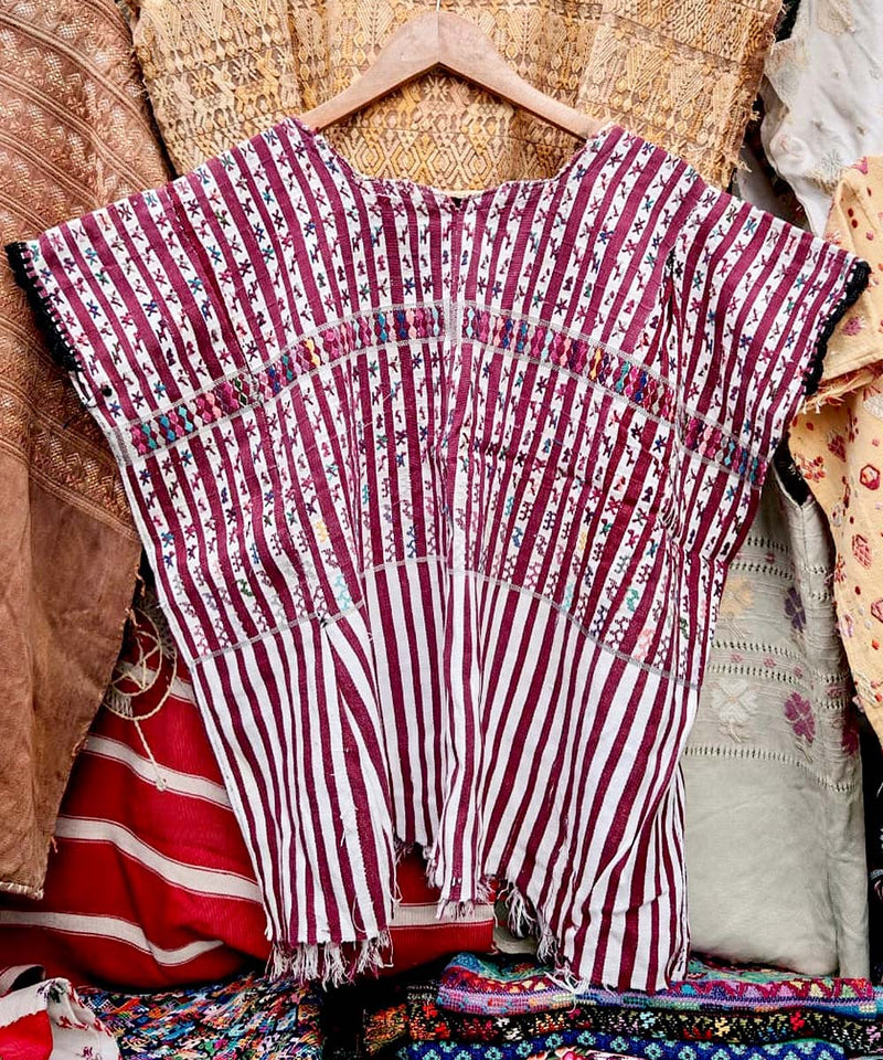 Red and white San Lucas huipil