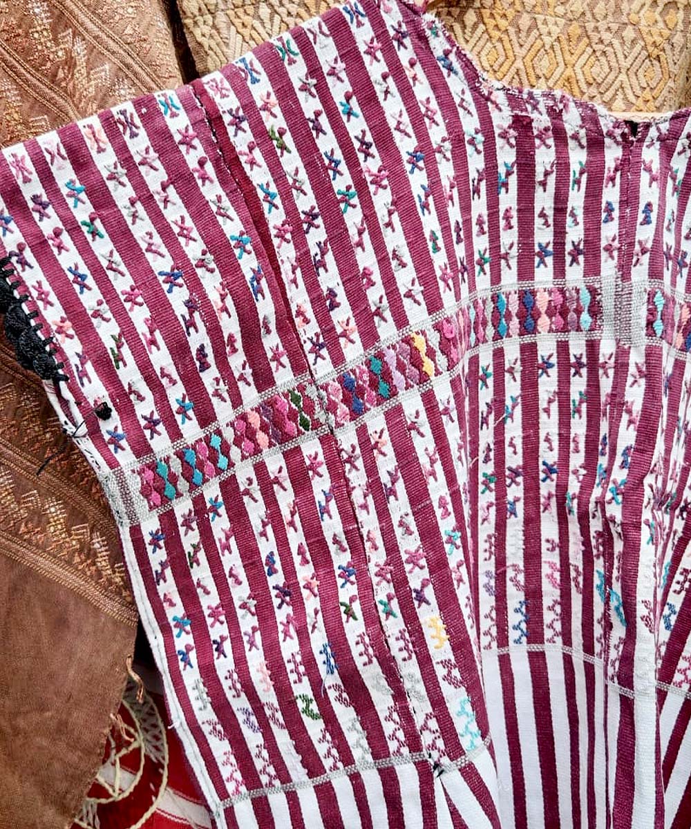 Red and white San Lucas huipil