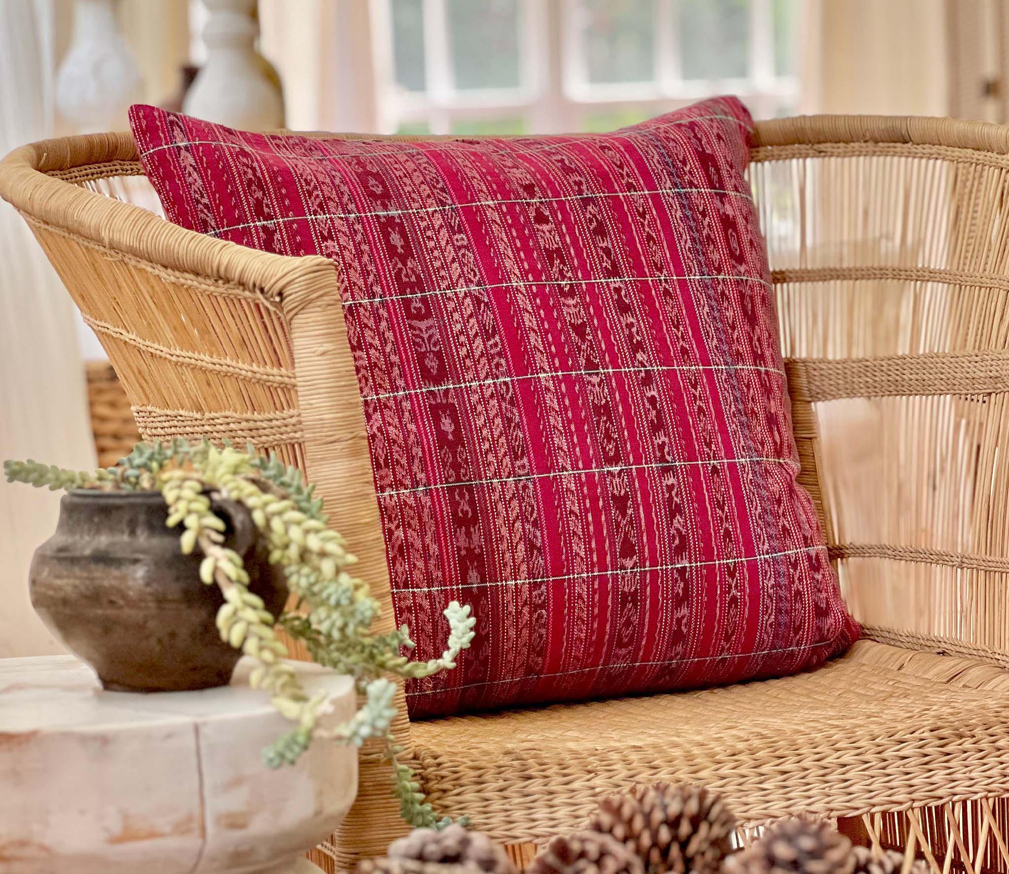 Embroidered Guatemalan huipil textile repurposed into a pillow