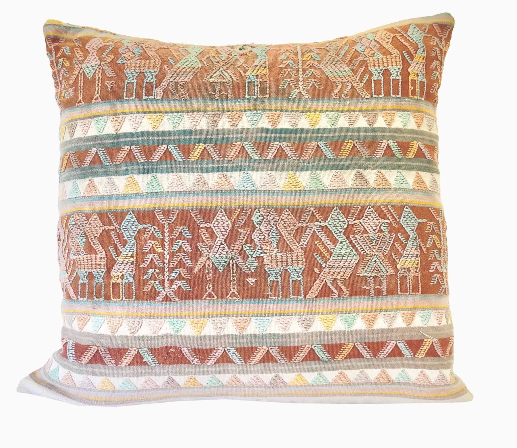 Embroidered Guatemalan huipil textile repurposed into a pillow
