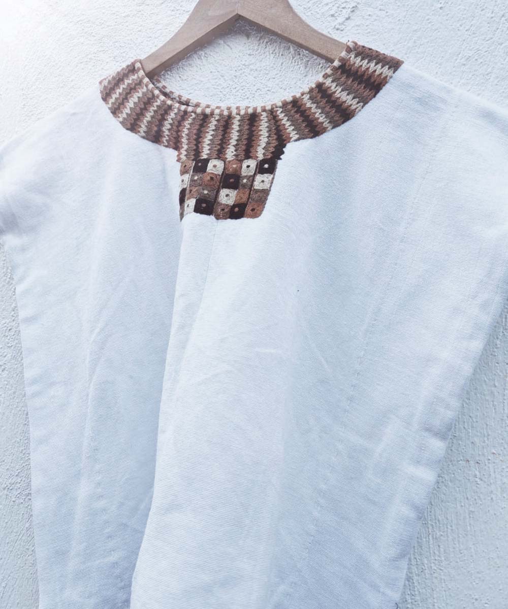 White huipil with brown ceremonial neckline