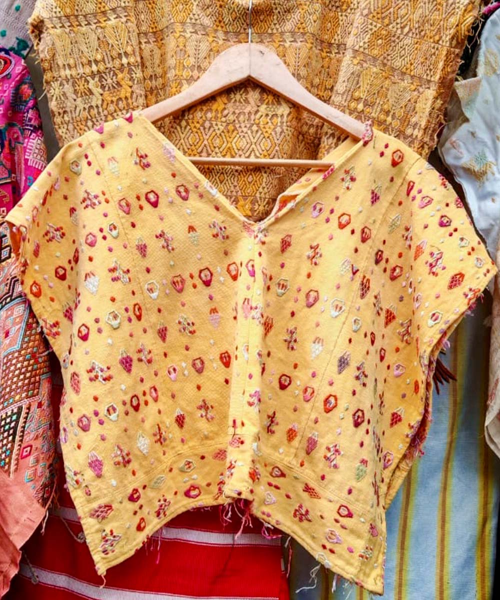 1 yellow and 1 fuchsia huipil for Stefany