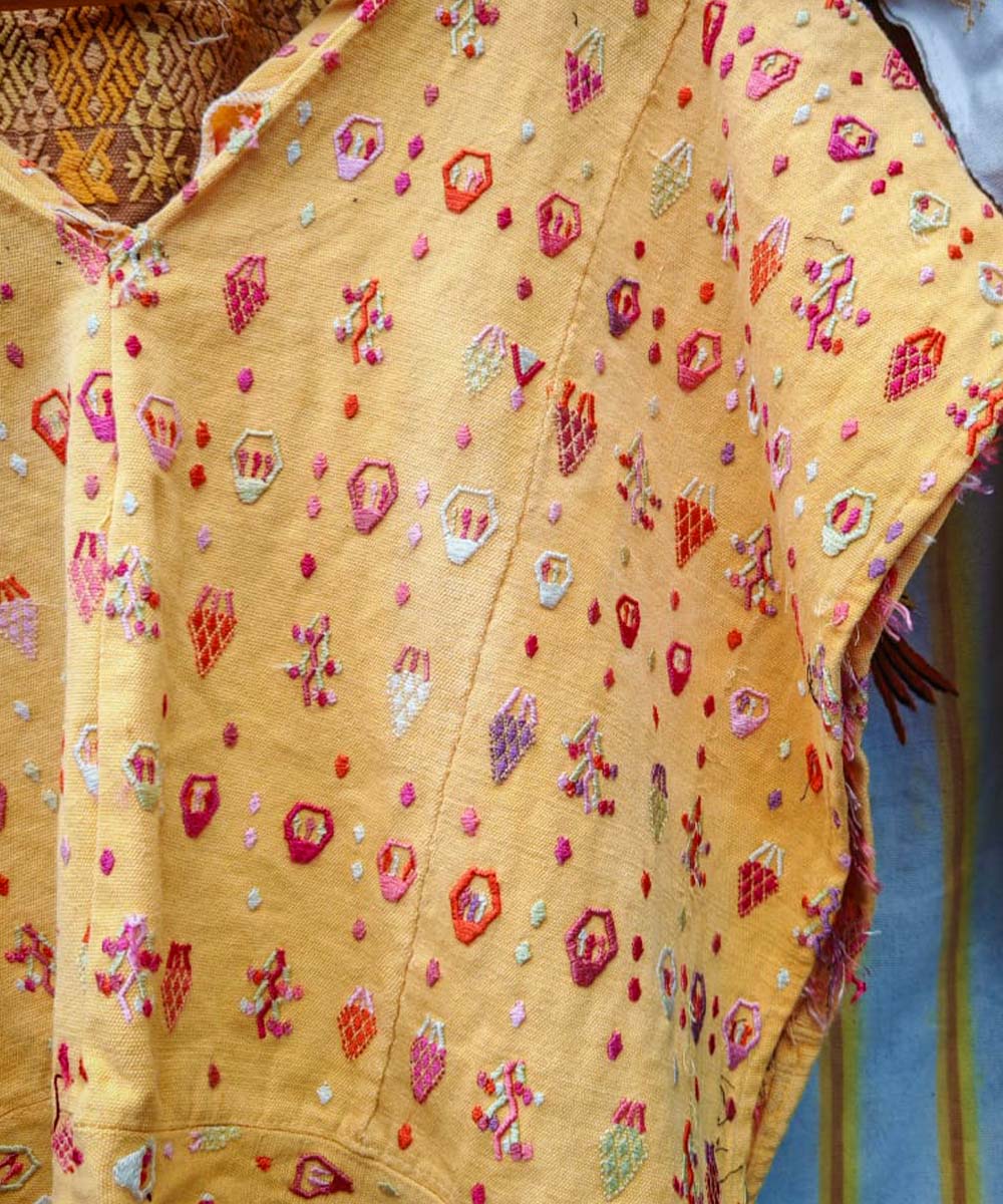 1 yellow and 1 fuchsia huipil for Stefany