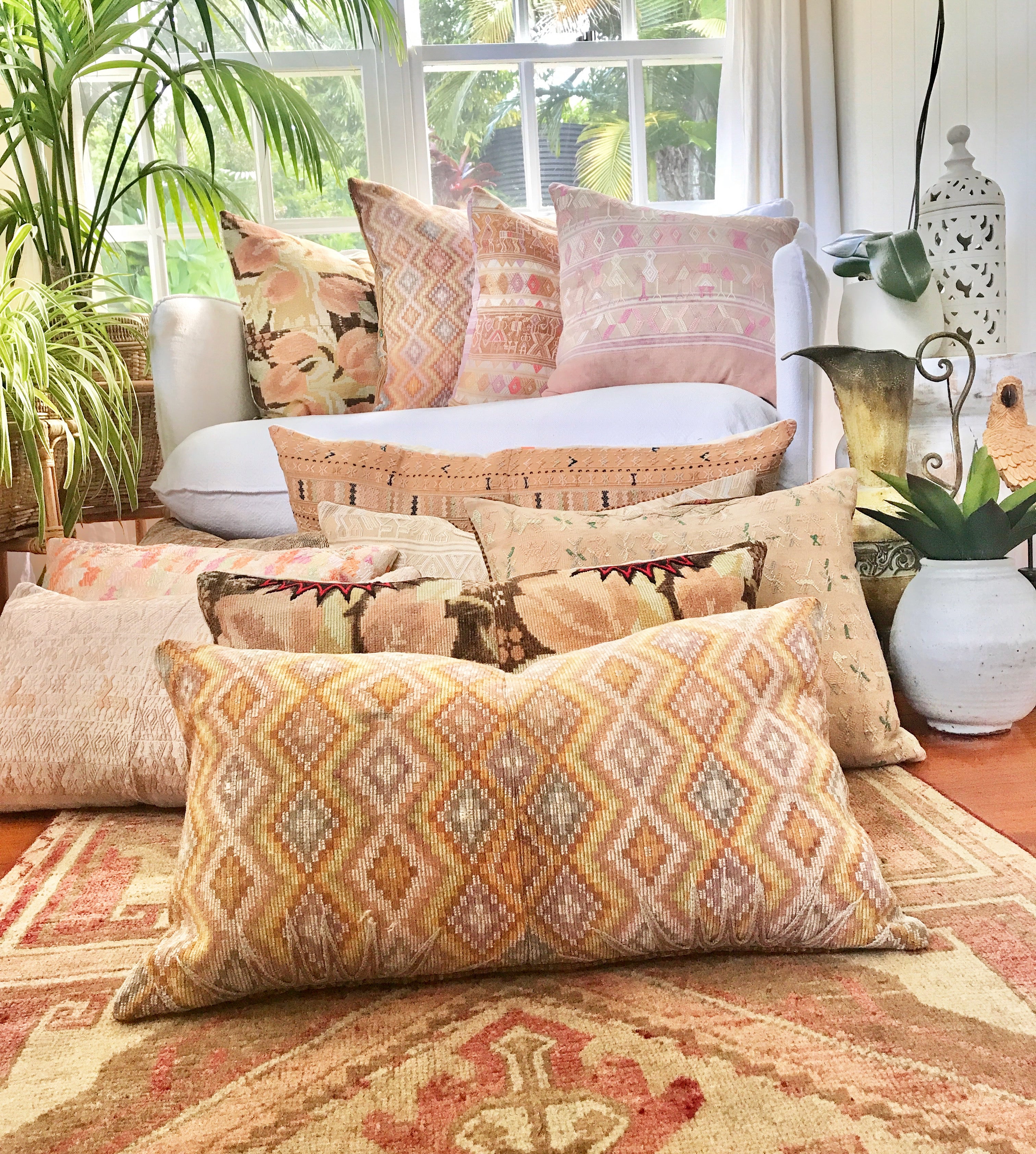 Vintage textile pillows made from a Guatemalan huipil and corte