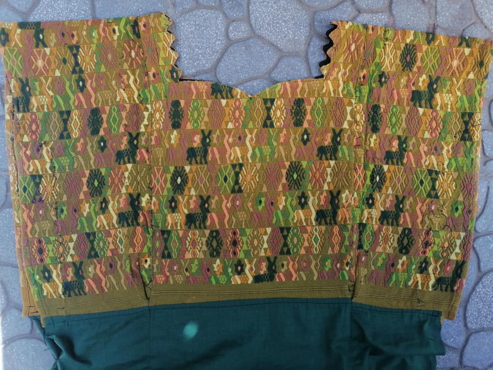 Guatemalan embroidered huipil pillow. Tribal symbols for bohemian decor.
